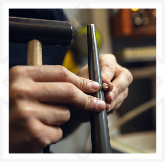 A jeweller at work in the OriAmore atelier